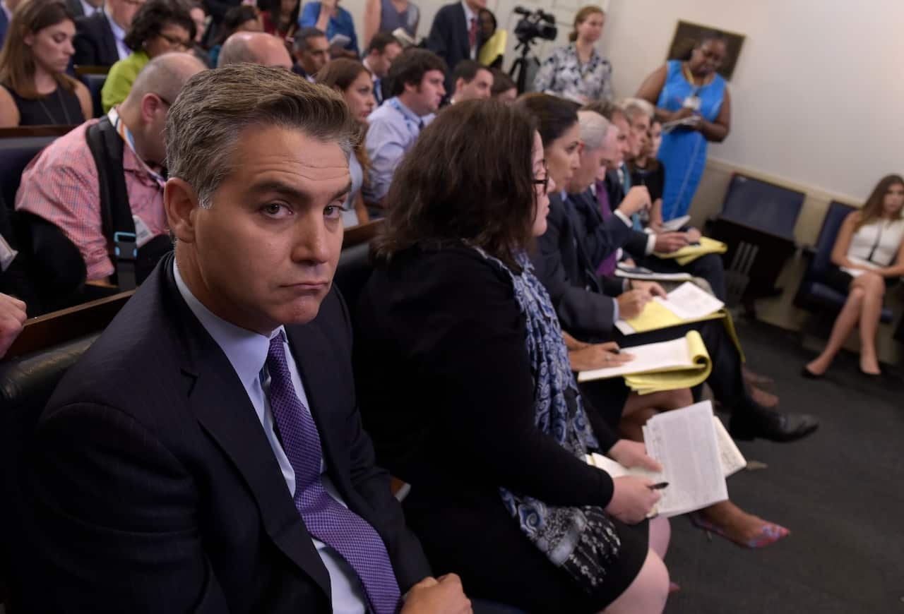 Jim Acosta of CNN listens during the daily briefing at the White House in Washington, Wednesday, Aug. 2, 2017 (AAP)