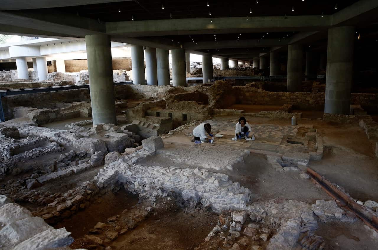 Archeologists take part in excavations beneath the Museum of Acropolis in Athens, Greece, 05 June 2019.
