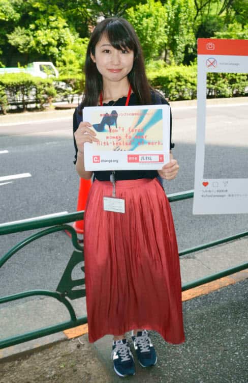 Actress and writer Yumi Ishikawa poses for a photo in Tokyo on June 3, 2019. Ishikawa submitted a petition to the labor ministry the same day calling for a ban on dress codes that force women to wear high heels at work (AAP)