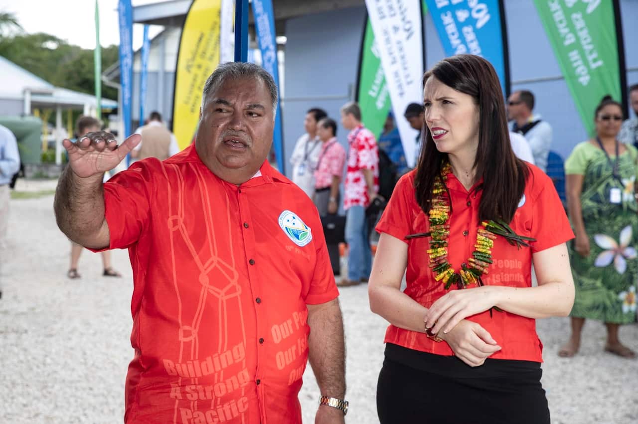 Nauru President Baron Waqa, left, talks with New Zealand Prime Minister Jacinda Ardern before the Pacific leaders gather for a photo opportunity