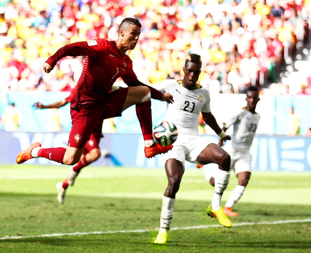 Nike's brightly-coloured shoes seen on Cristiano Ronaldo and Ghana players during the World Cup.