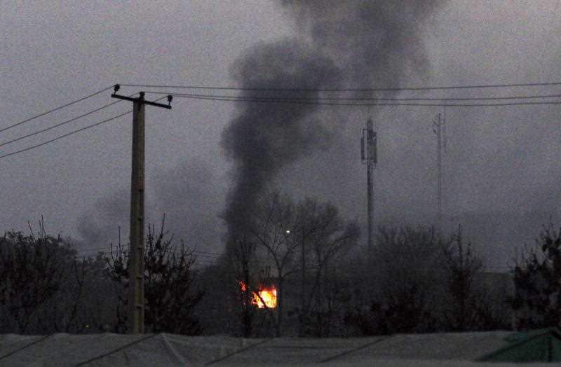 Flames rise from the scene of a suicide car bomb attack in Kabul, Afghanistan.
