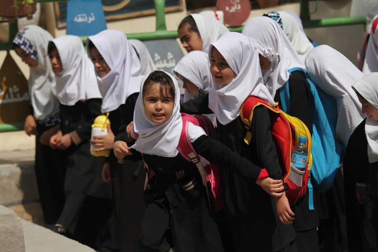 Afghan girls attend a school in Herat, Afghanistan.