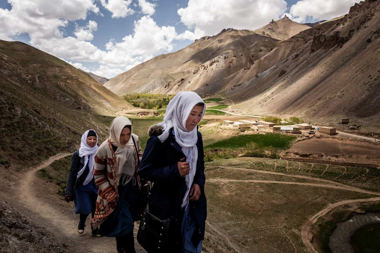 A file photo of female students walking home from school in Yakawlang, Afghanistan, 19 May, 2019. 