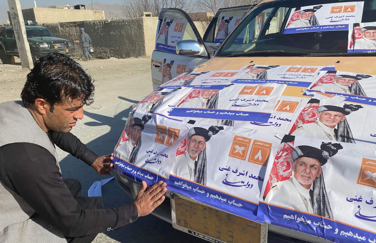 Supporters of Afghan presidential election winner Ashraf Ghani celebrate on the streets of Kabul after the announcement.