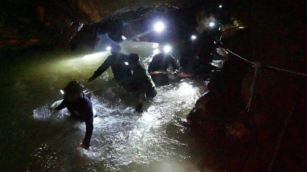 Rescue personnel from the Australian Federal Police are among the international contingent involved in getting the boys out.