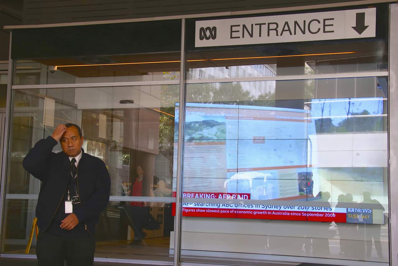 Security staff  at the main entrance to the ABC building located at Ultimo in Sydney.