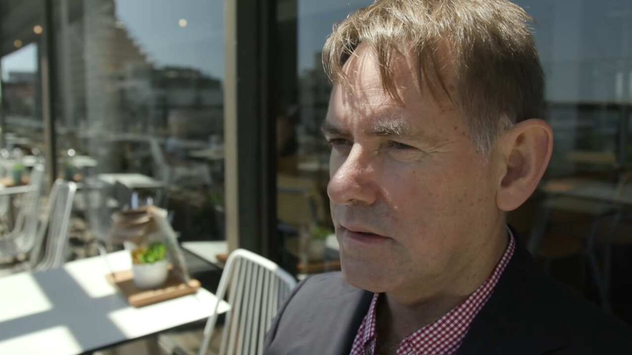 Dr John Rule is one of 25,000 people living with HIV in Australia. 