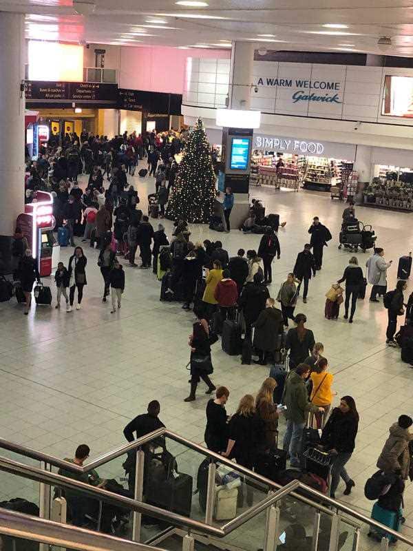 Lines of passengers at Gatwick Airport after the closure.