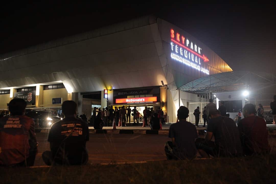 Malaysians gather in front of Subang Airport in an attempt to prevent defeated prime minister Najib Razak from leaving the country.  