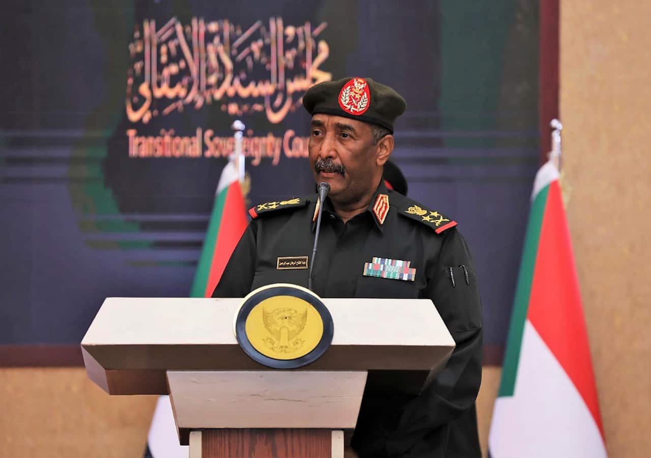Sudan's top general Abdel Fattah Al-Burhan speaks during a ceremony to reinstate Prime Minister Abdalla Hamdok in Khartoum, Sudan, 21 November, 2021. 