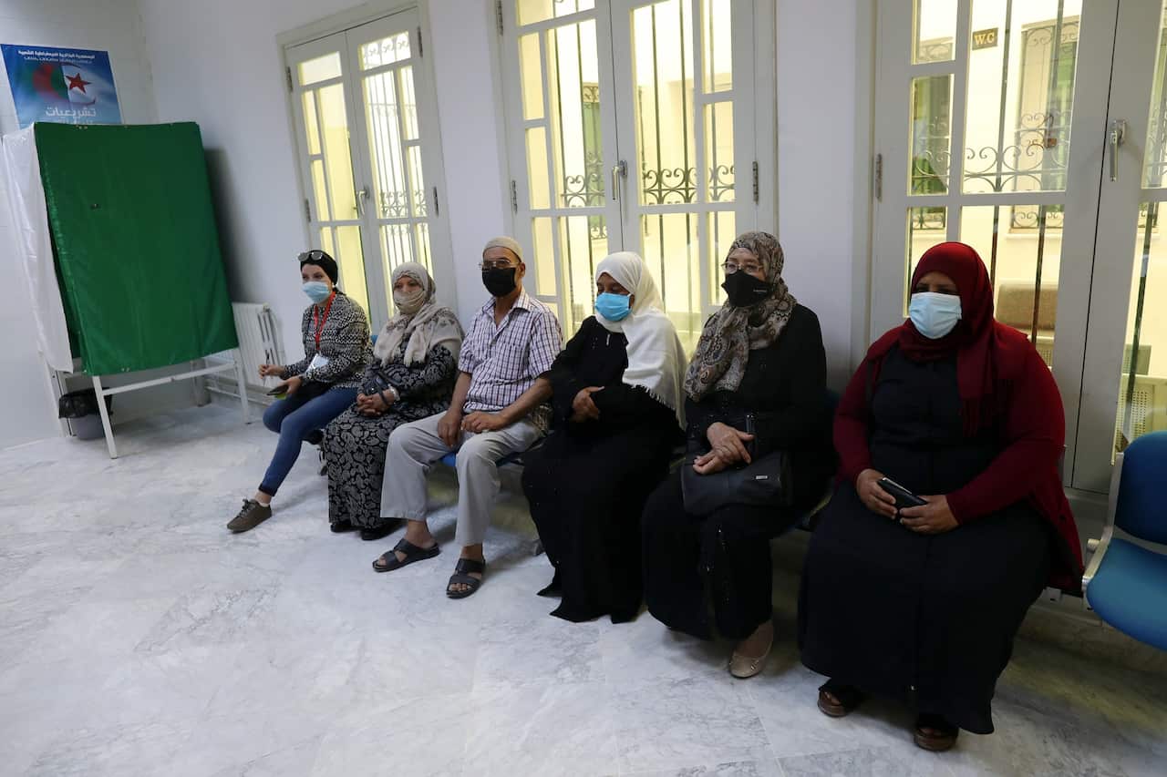 Algerians wait to vote at a polling station in Tunis, Tunisia on 10 June 2021.  