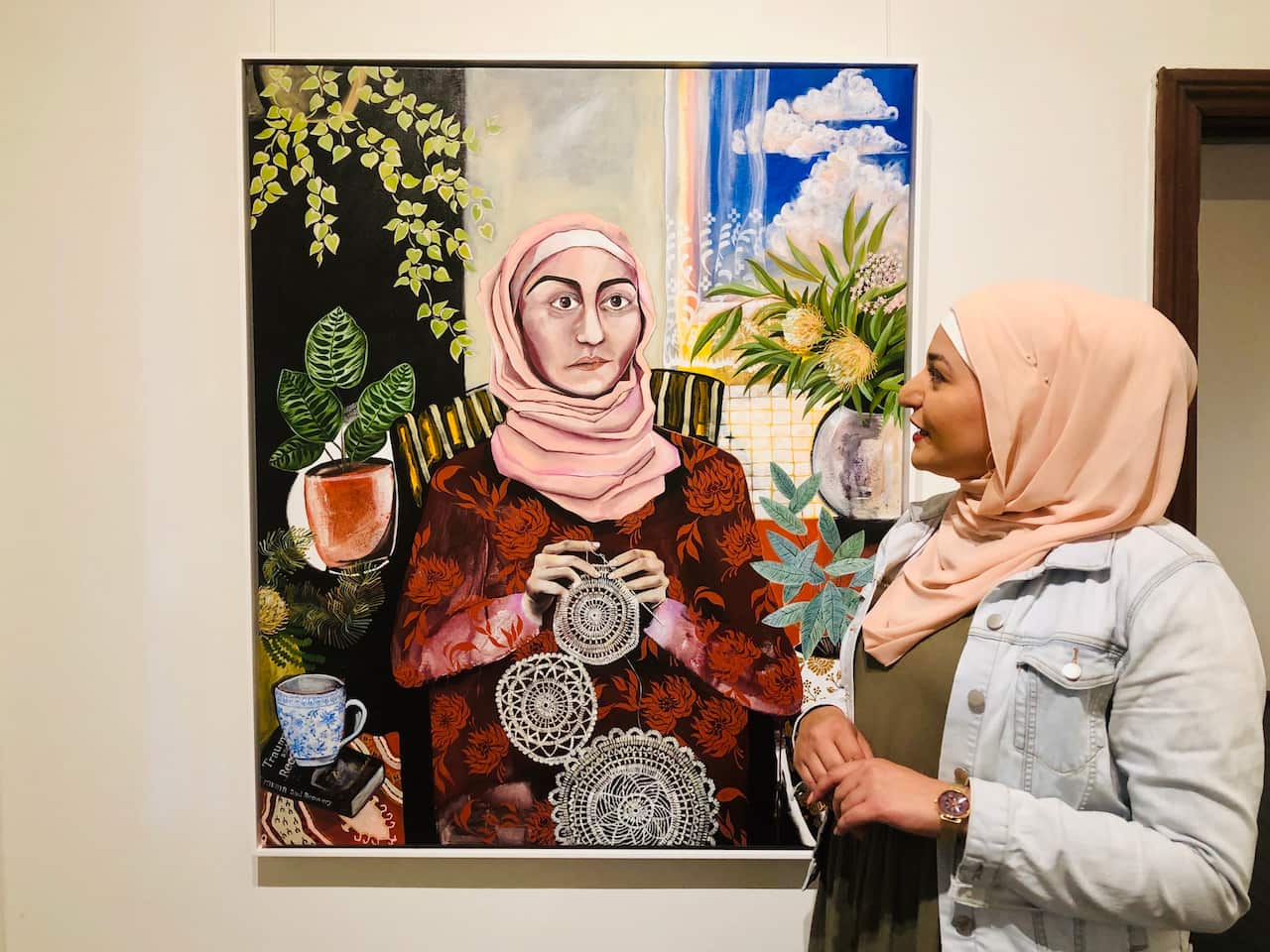 Amani Haydar, at a recent exhibition with a new self-portrait.