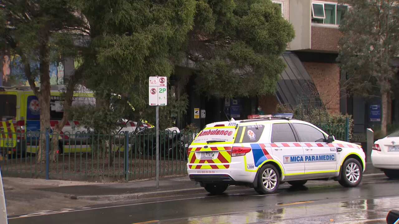 Ambulances at public housing towers in Melbourne's north