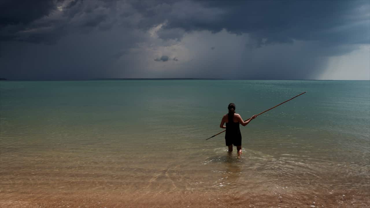 Antonia Burke, pictured fishing off the Tiwi Islands, is concerned about the environmental impact of the Barossa project. 