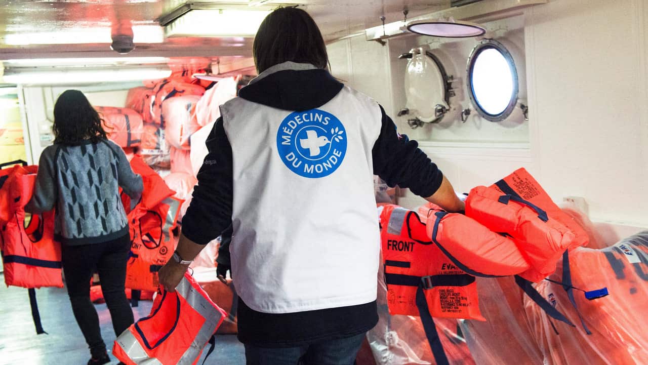 Crew memebers prepare for a rescue mission. 