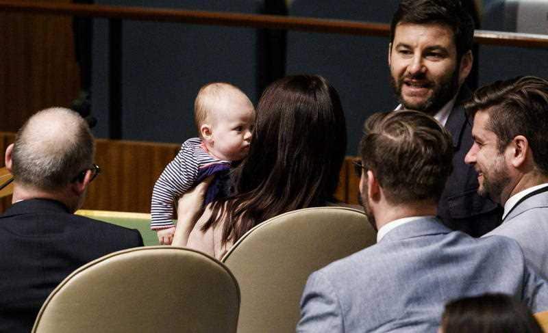 NZ Prime Minister Jacinda Ardern holds her daughter Neve after addressing the UN.