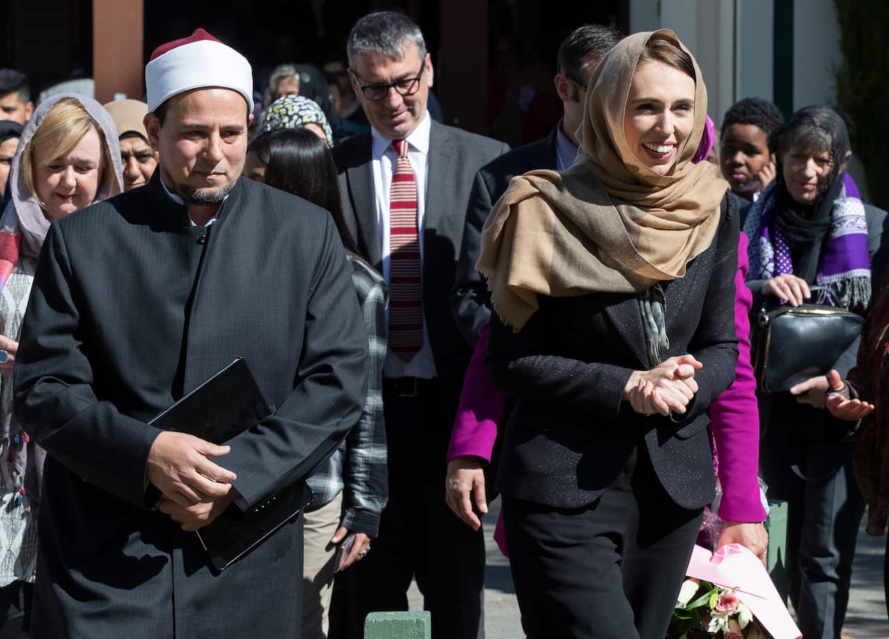 New Zealand Prime Minister Jacinda Arder and Imam Gamal Fouda prepare to unveil a memorial plaque in memory of the victims on 24 September 2020.