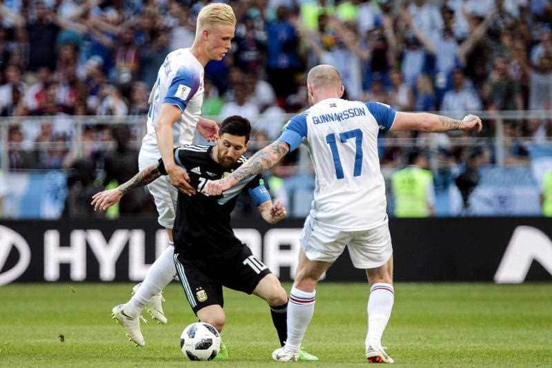 Argentina X Iceland - Argentina's Messi is bidding with Gunnarsson of Iceland during a match at Arena Otkrytie Stadium for the 2018 World Cup.
