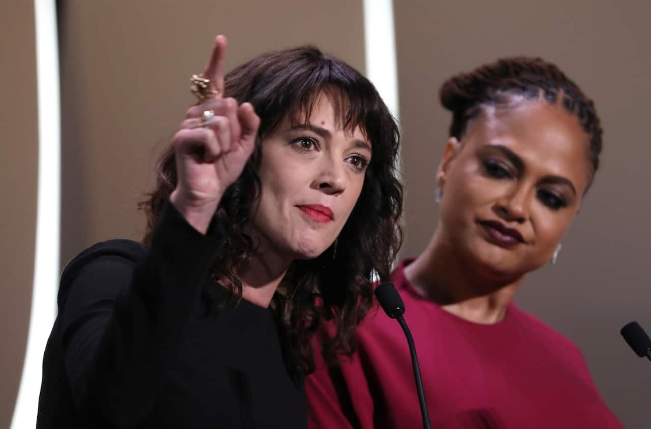Actress Asia Argento, left, speaks about being raped by Harvey Weinstein at the 71st international film festival, Cannes