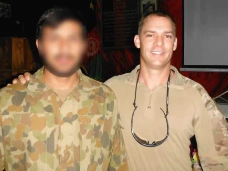 Captain Jason Scanes and his Afghan interpreter.