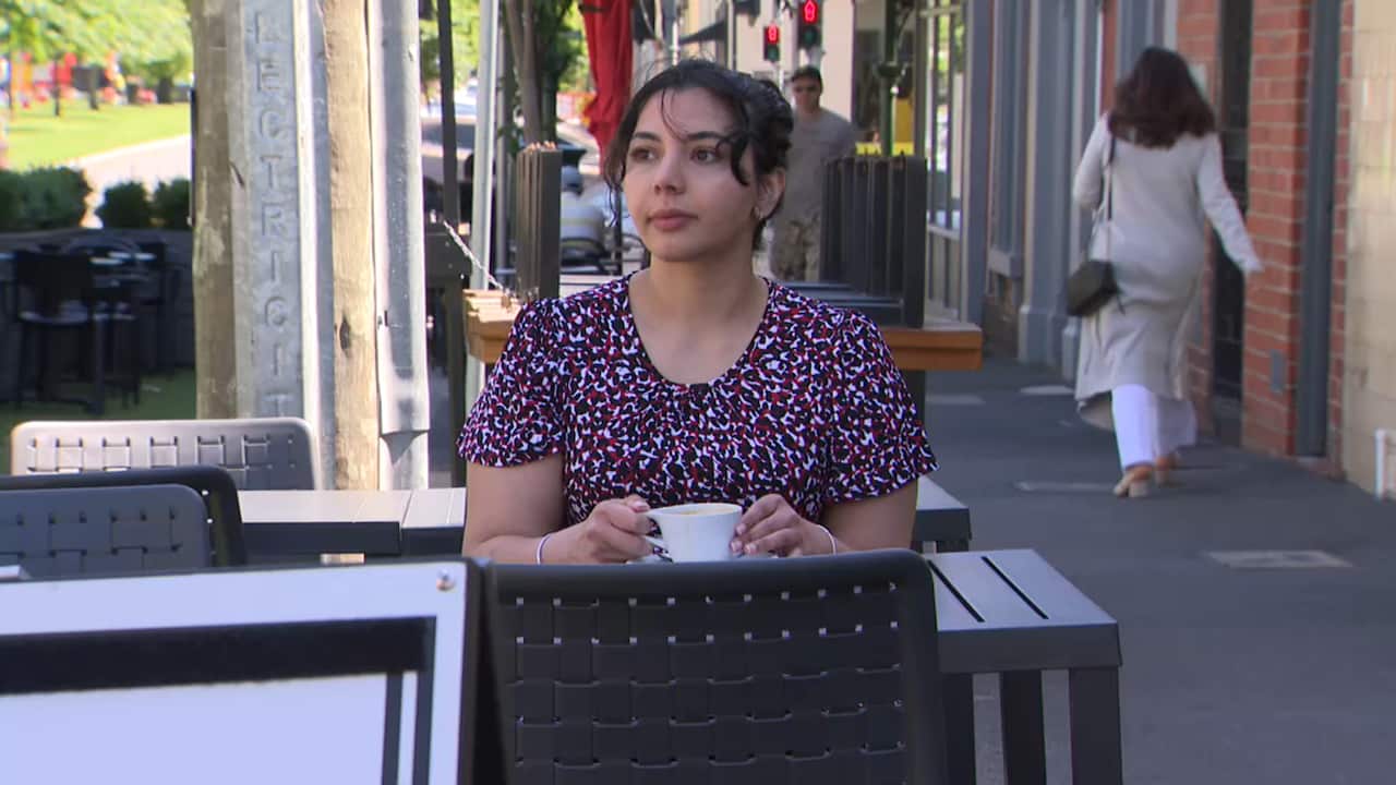 Student Arshdeep Cheema at a cafe.