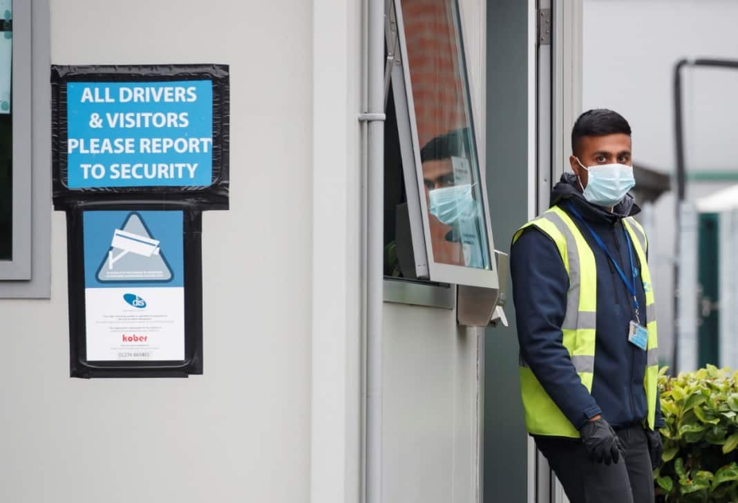 A security guard at Kober meat processing plant in Cleckheaton, that has been confirmed as the location of a localised coronavirus outbreak.