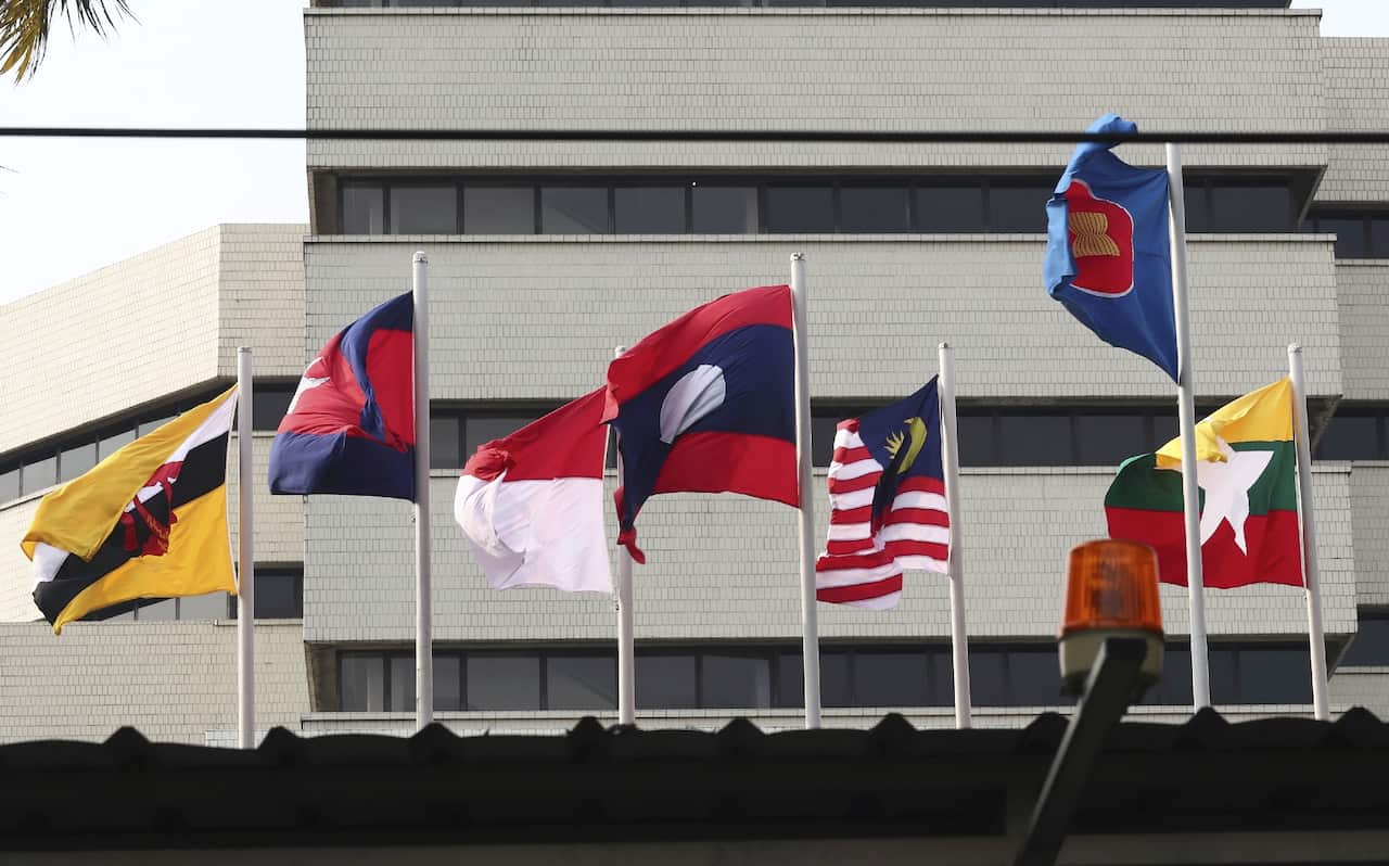 Flags of member countries fly outside the ASEAN Secretariat building in Jakarta, Indonesia.