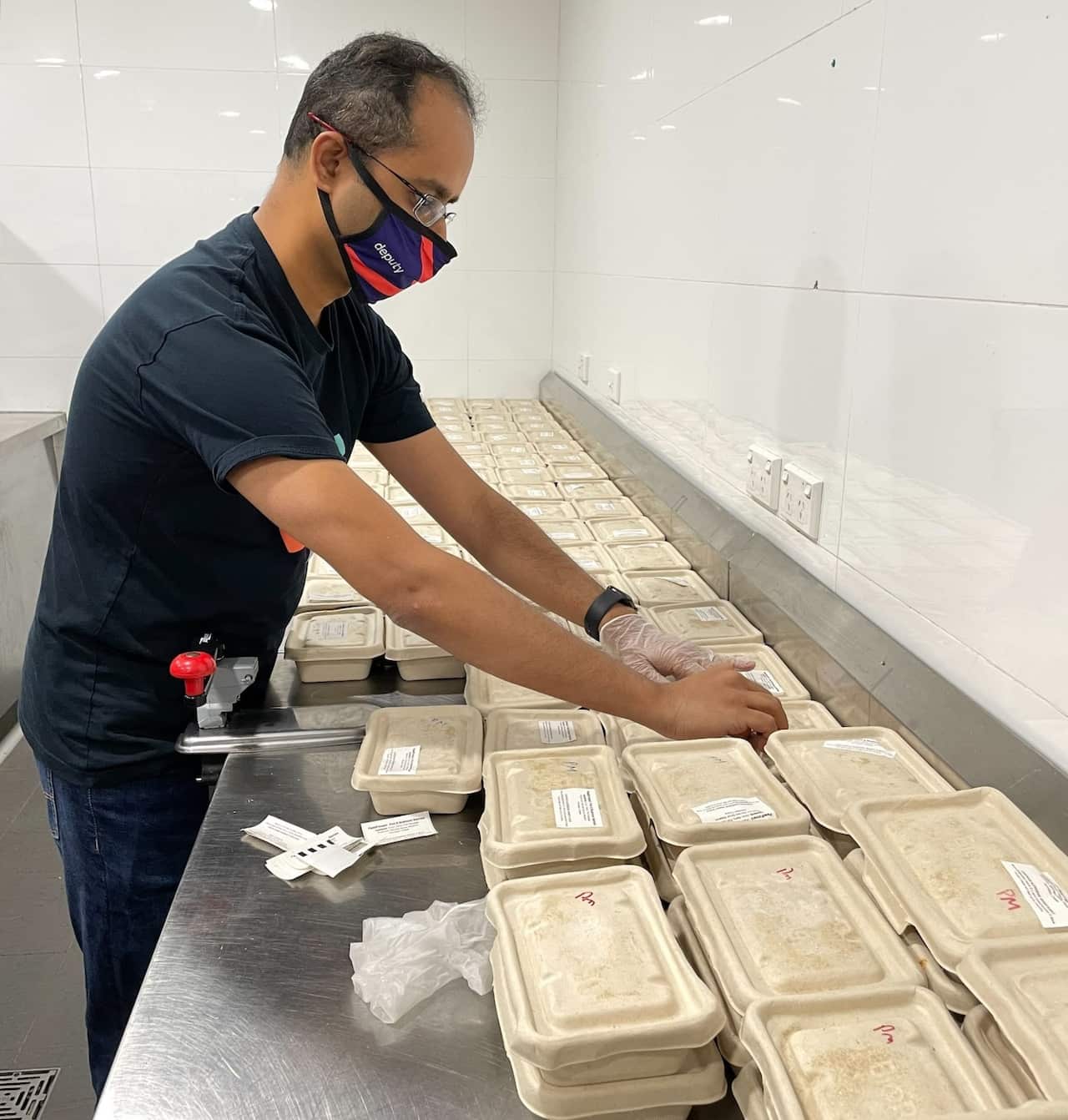 Hundreds of meals are prepared and boxed daily. 