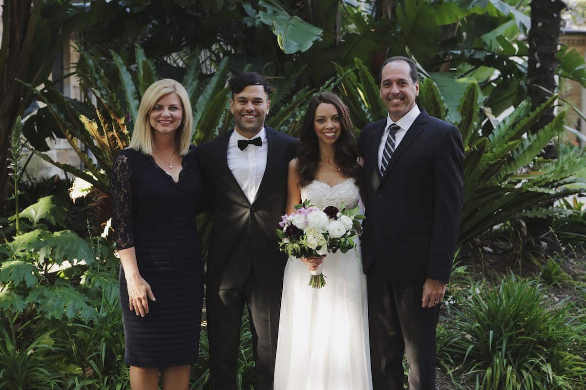 Ashton Kobler's parents, pictured on her wedding day, are no longer able to be with her for the birth of her daughter due to coronavirus travel restrictions.
