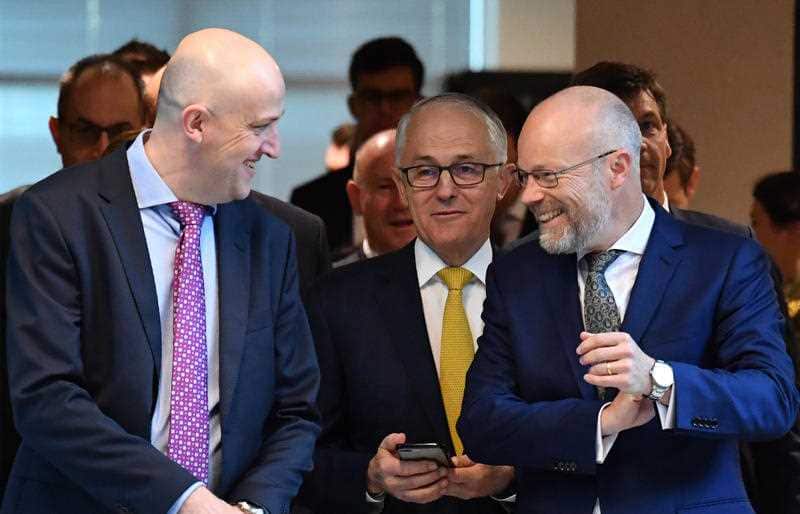 Australian Signals Directorate Director-General Mike Burgess, then-Prime Minister Malcolm Turnbull and National Cyber Coordinator Alastair MacGibbo.