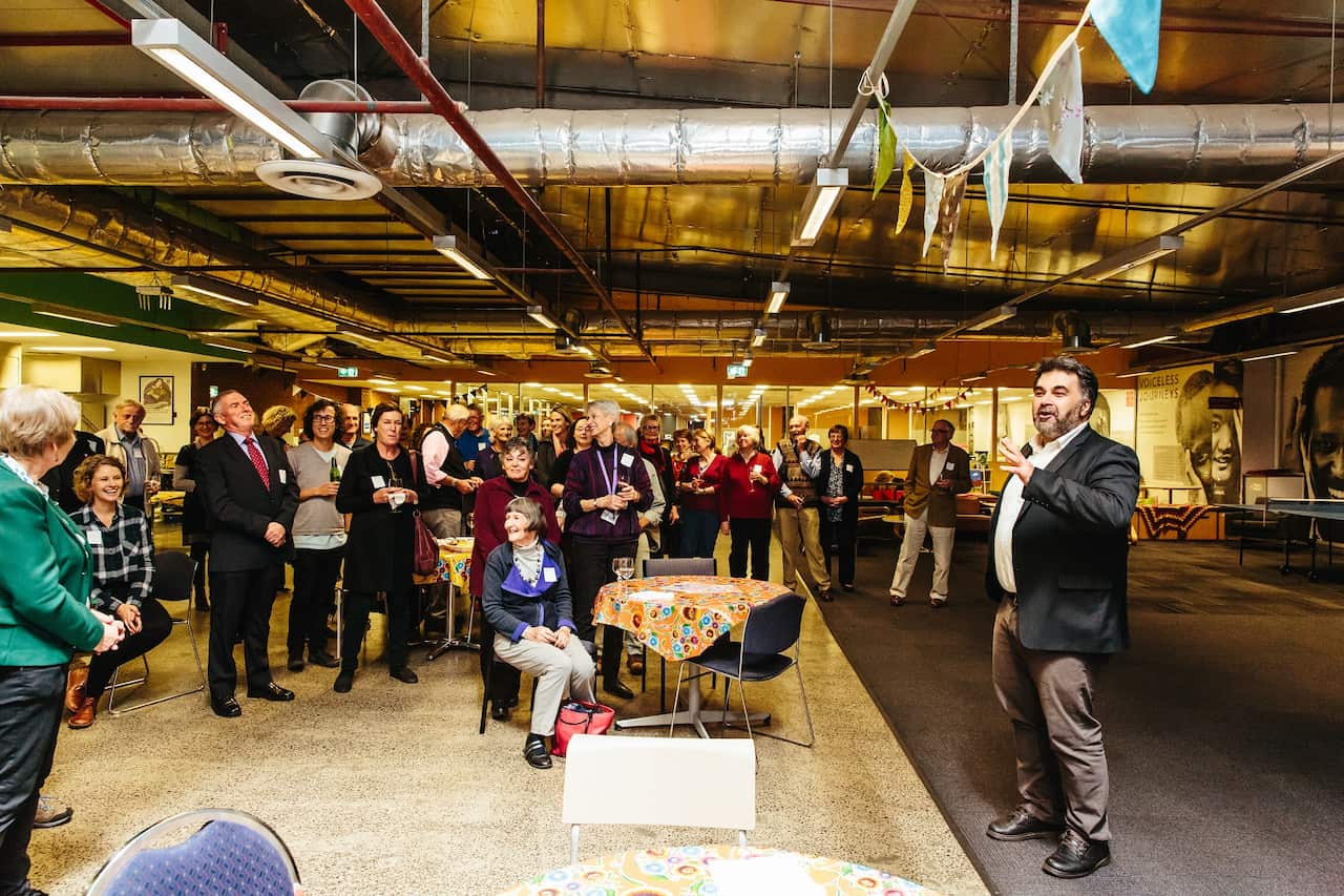 Asylum Seeker Resource Centre founder Kon Karapanagiotidis (far left) with the centre's volunteers.