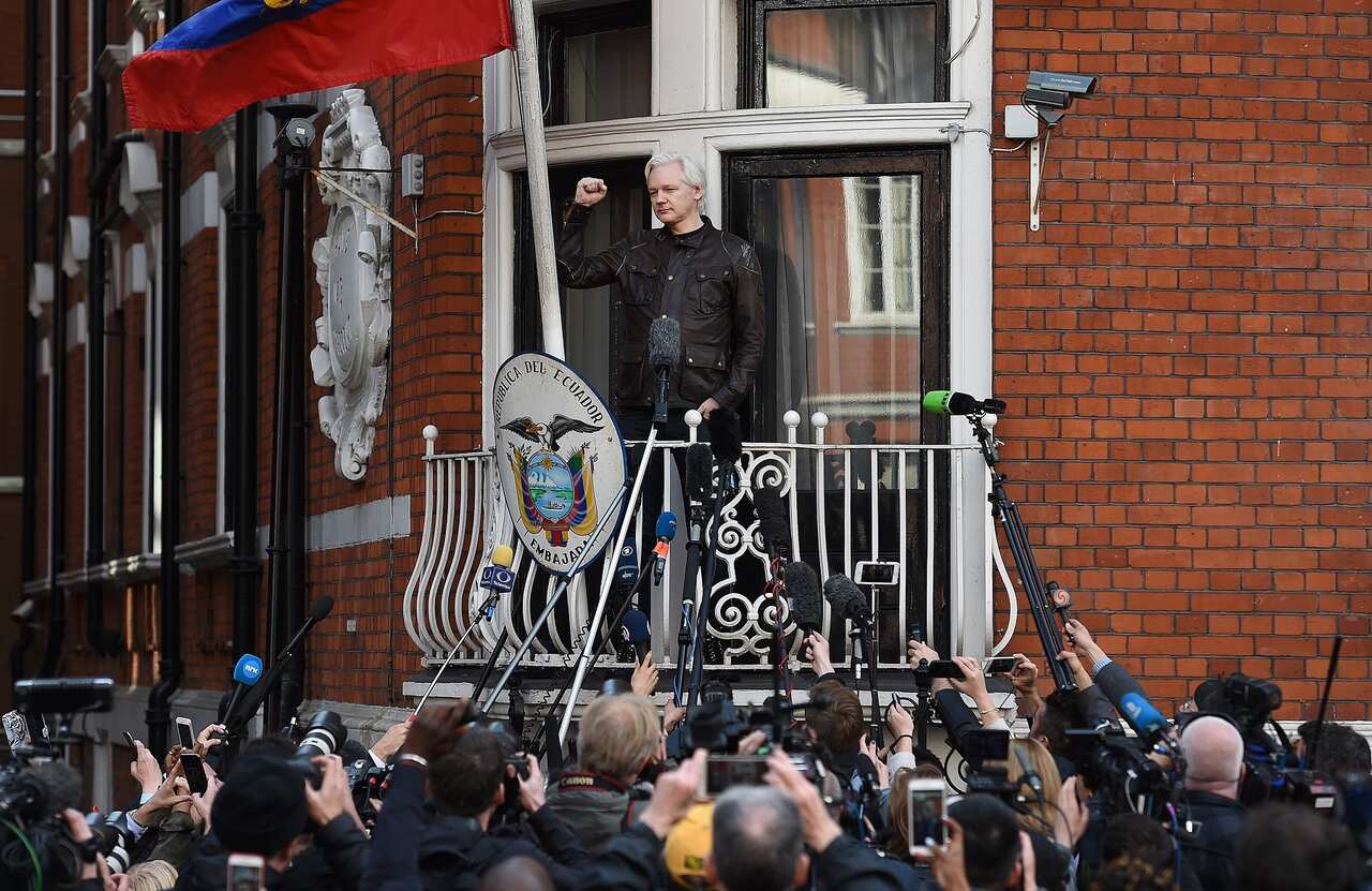 Julian Assange speaks to the media from the balcony of the Ecuadorian Embassy in London, 19 May 2017.