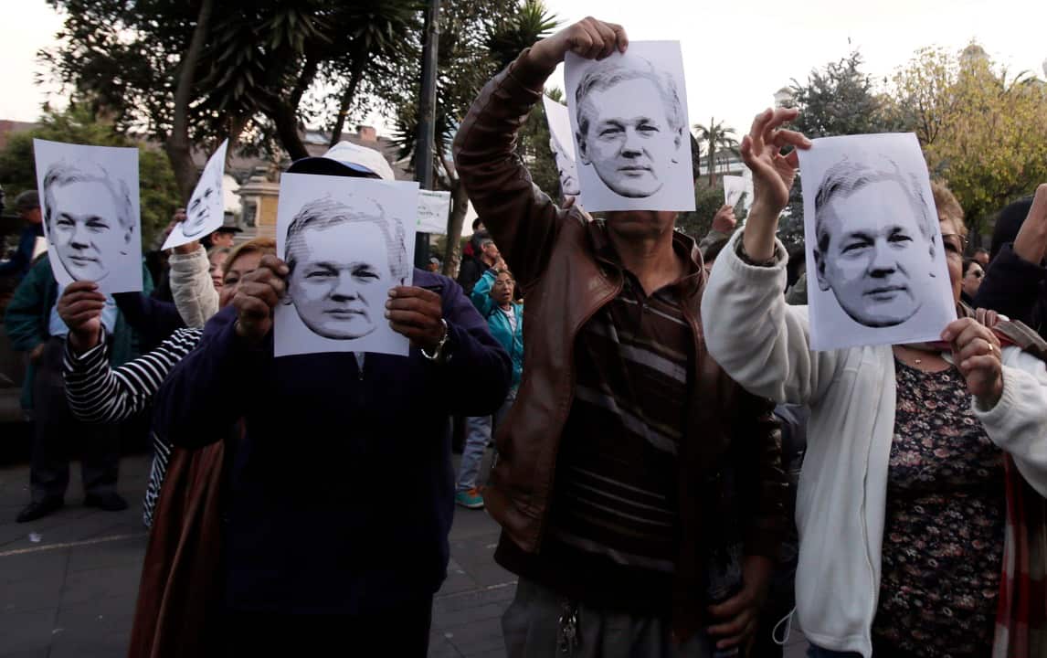 Supporters of Julian Assange rally in Ecuador.