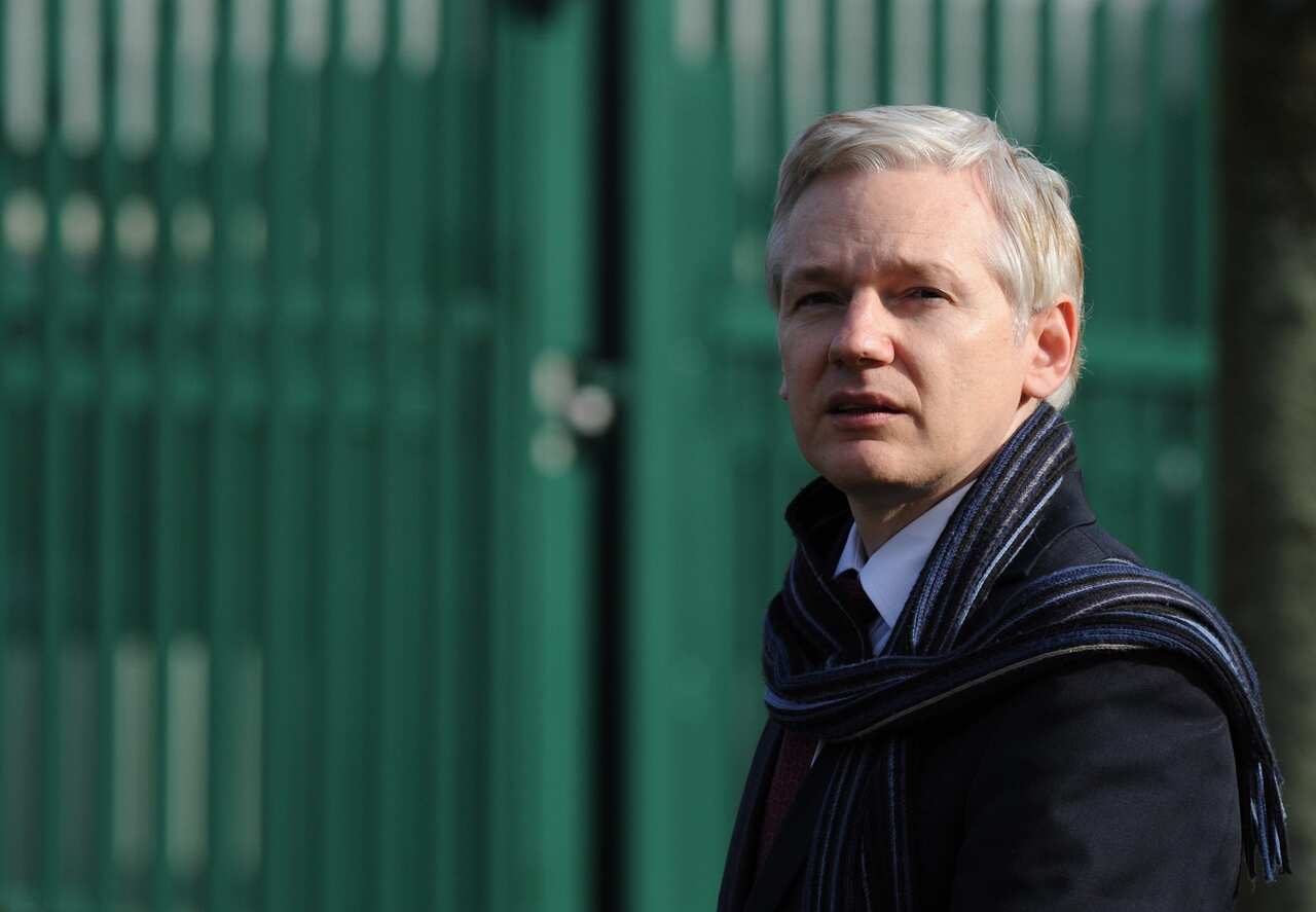 Julian Assange speaks to the media outside Belmarsh Magistrates court, after a judge has decided he has to face extradition  to Sweden, in London Great Britain on 24 February 2011.  EPA/FACUNDO ARRIZABALAGA