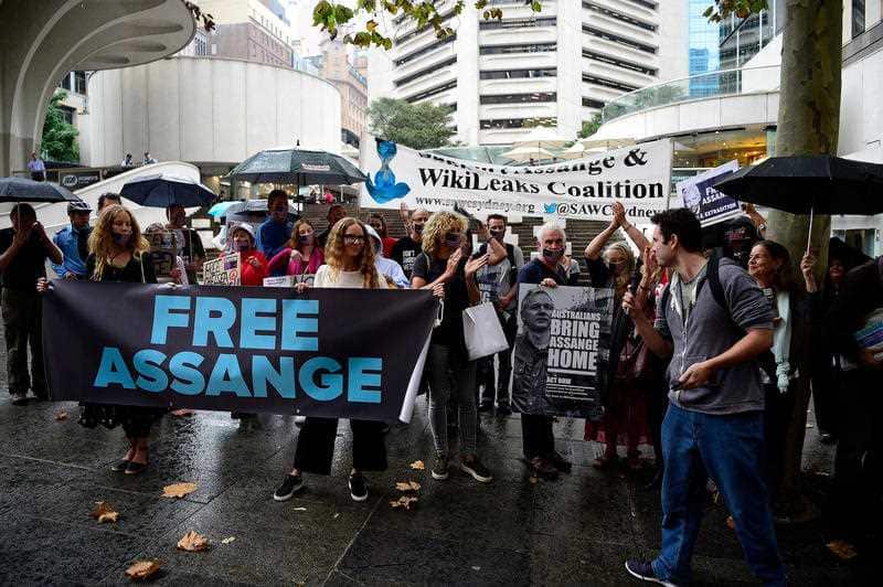 Pro-Julian Assange supporters march in Martin Place.