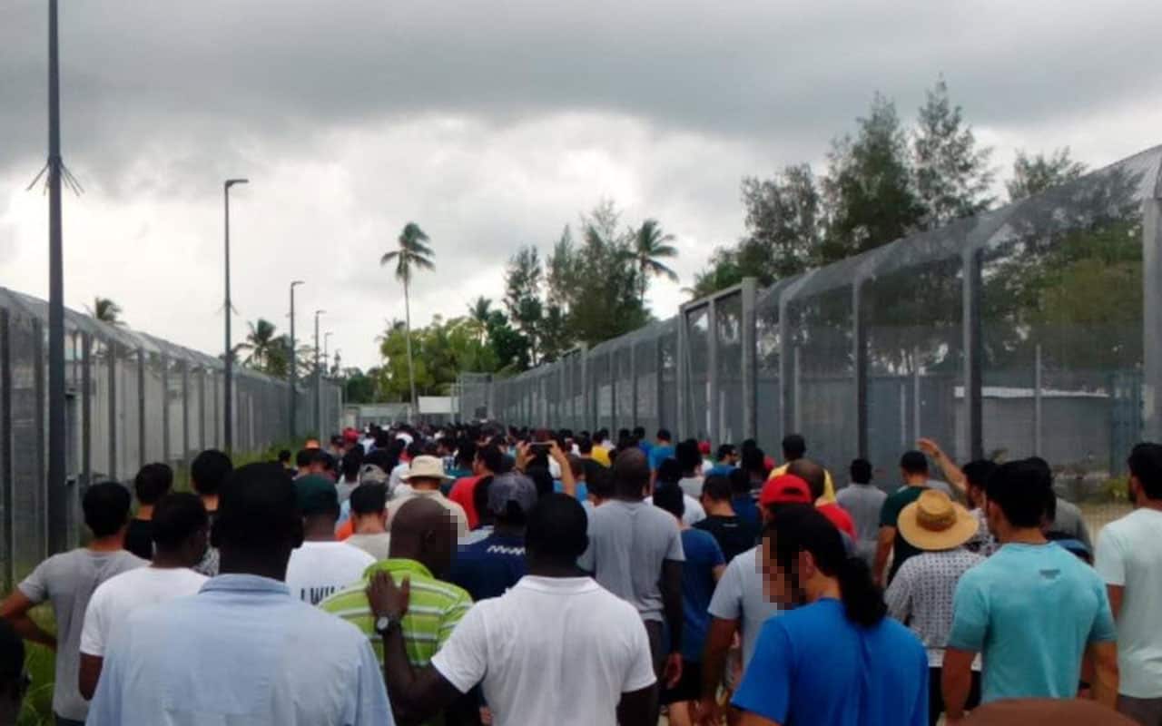 A photograph of a protest at Manus Island in wake of the death of Hamed Shamshiripour.