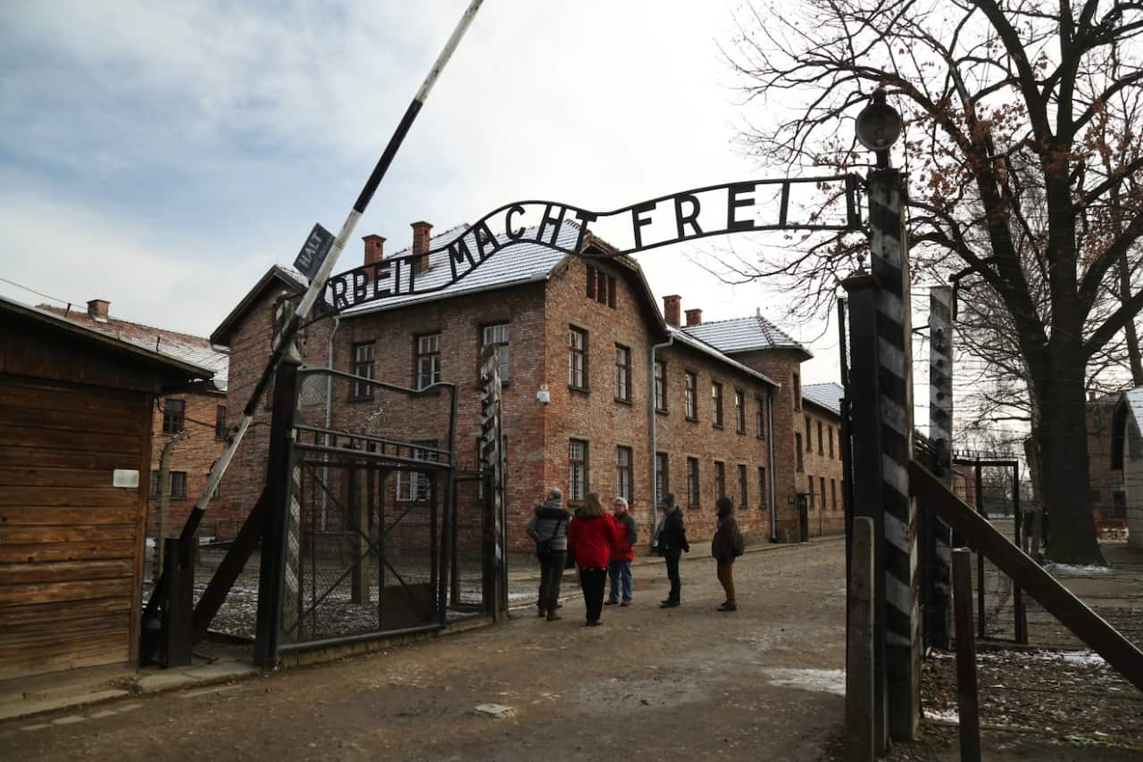 The infamous "arbeit macht frei" ("work sets you free") entrance gate to Auschwitz.