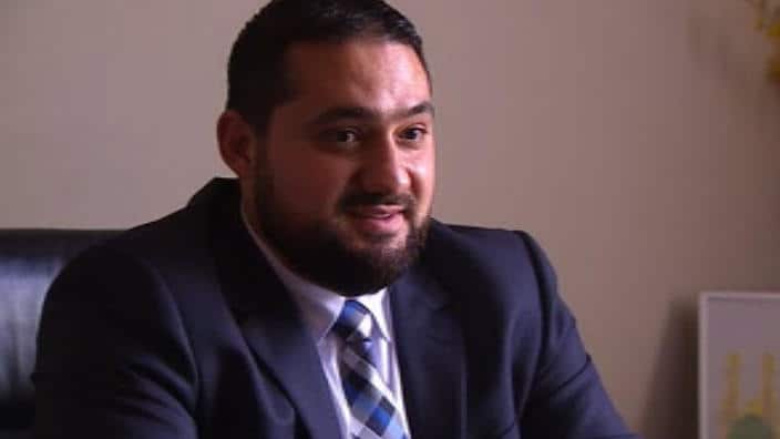 The Principal of Al Amanah College in Liverpool, Ayman Alwan, says he is a proud Australian Muslim. (Photo: SBS News)