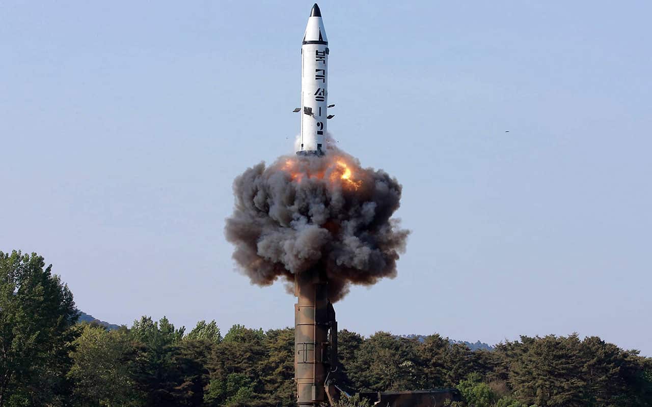 a solid-fuel "Pukguksong-2" missile lifts off during its launch test at an undisclosed location in North Korea