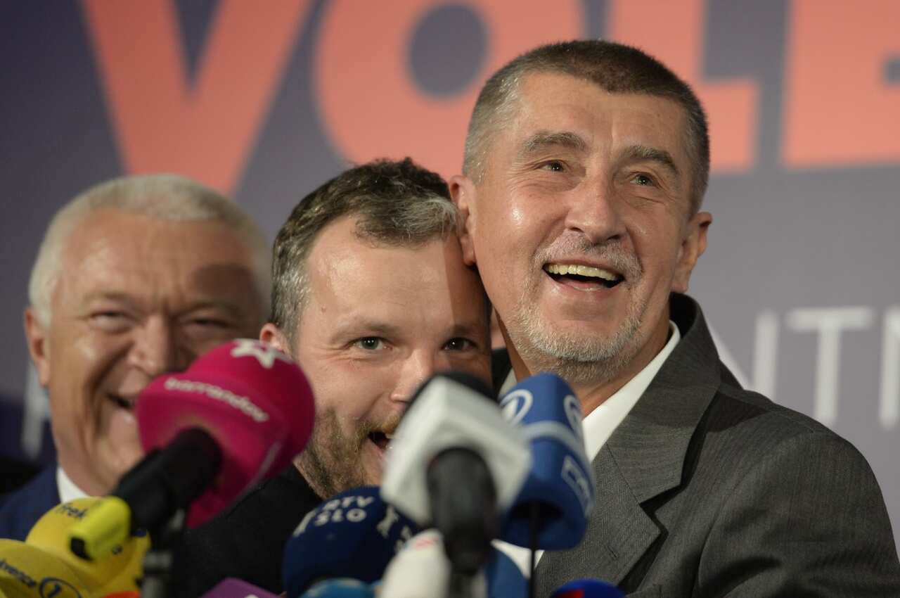 Andrej Babis, chairman of the political movement ANO 2011, right, and Marek Prchal celebrate results of the general elections (AAP)