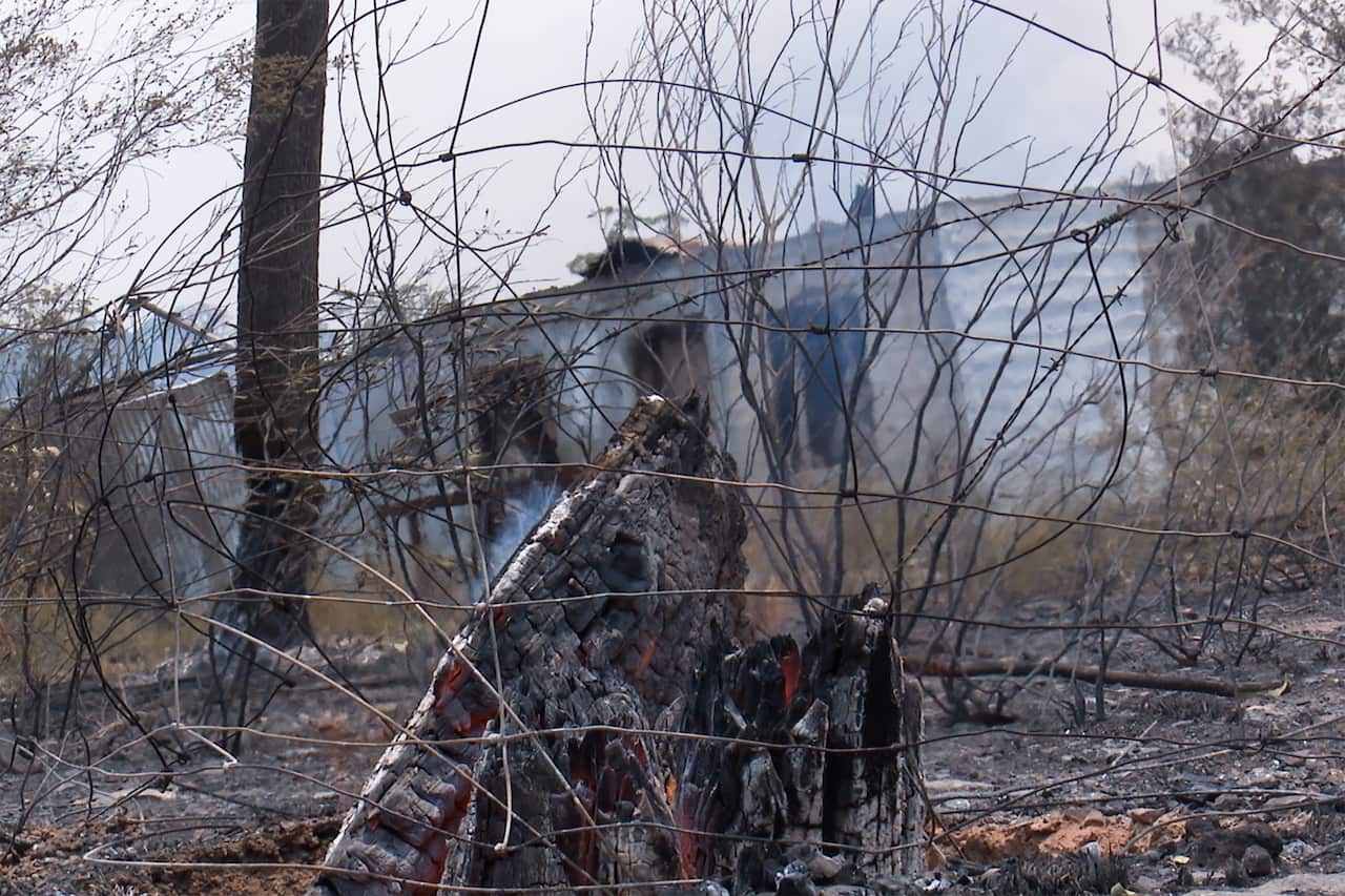 Emergency services say little remains of the village of Balmoral after the fires.