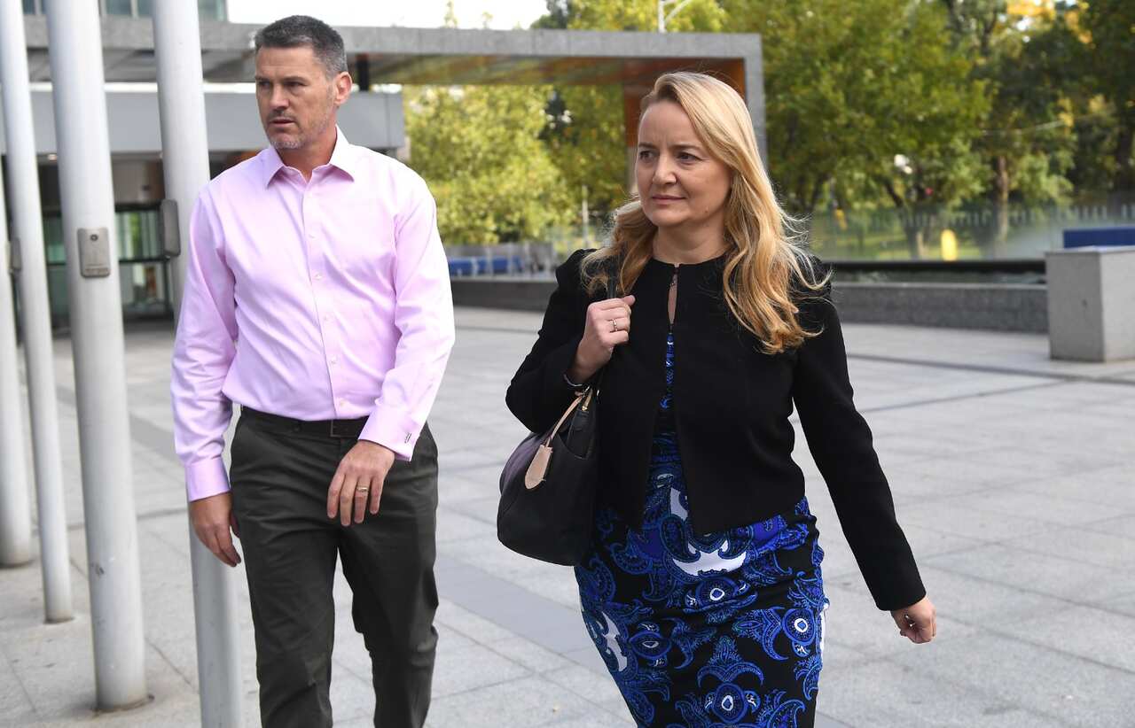 Executive General Manager of Commonwealth Private Marianne Perkovic (right) leaves the banking services royal commission in Melbourne