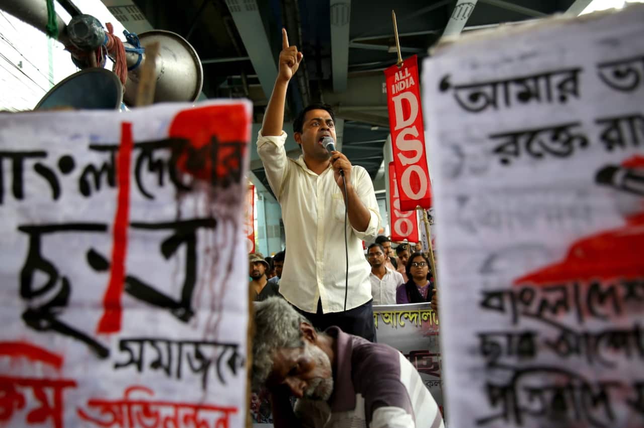 Indian Democratic Students Organization (DSO) activists shout against Bangladesh government during a protest near Bangladesh high commission