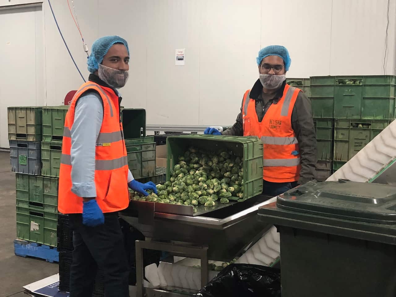 Barinder Puri and staff member