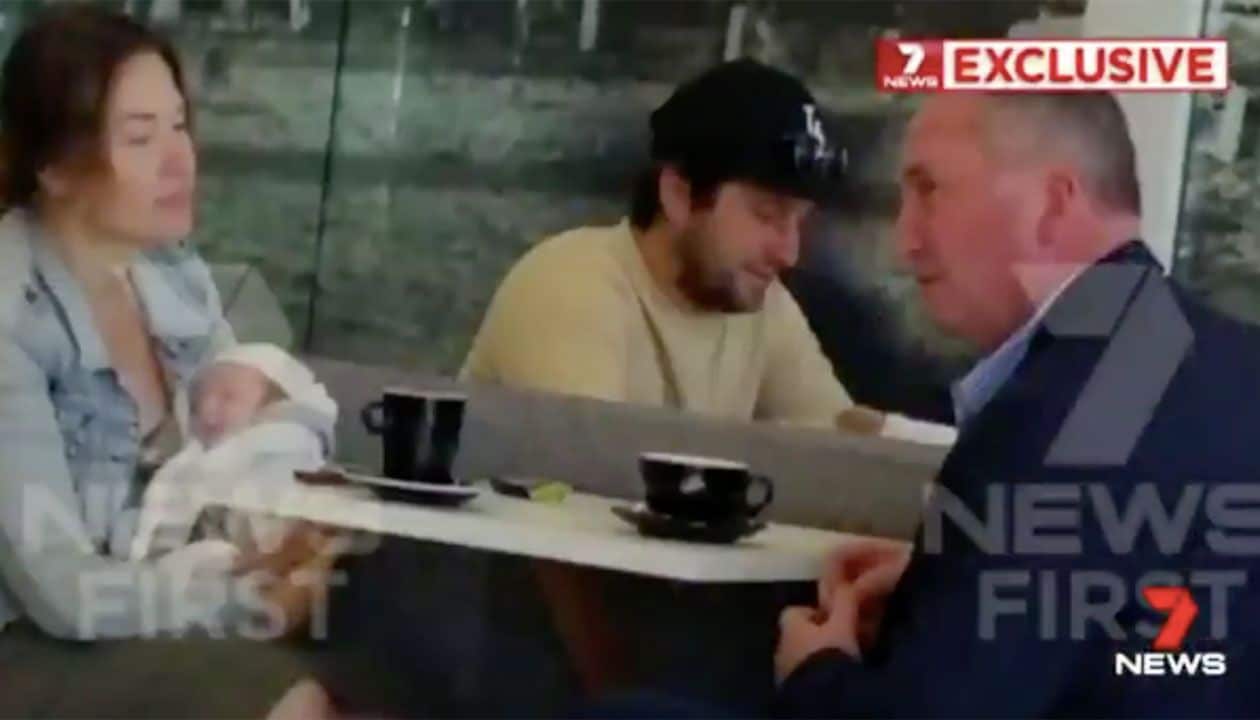 Vikki Campion holds baby Sebastian while Barnaby Joyce looks on. 