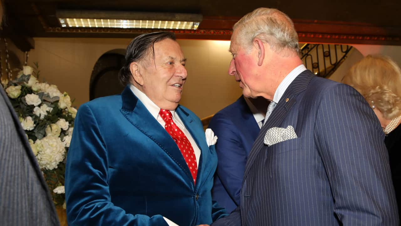 Prince Charles meets Barry Humphries.