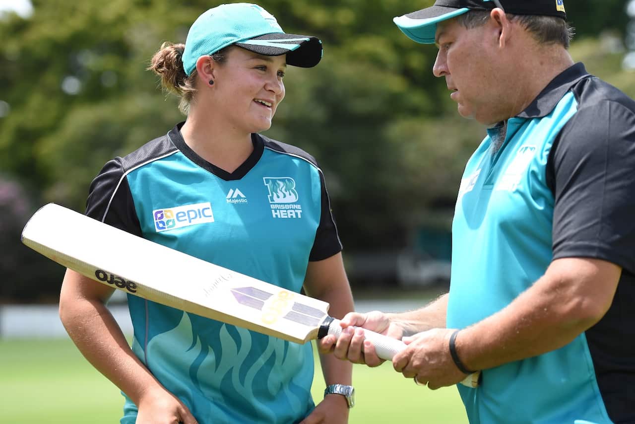 Barty (left) looks on to Brisbane Heat coach Andy Richards in Brisbane, Wednesday, Oct. 14, 2015. 