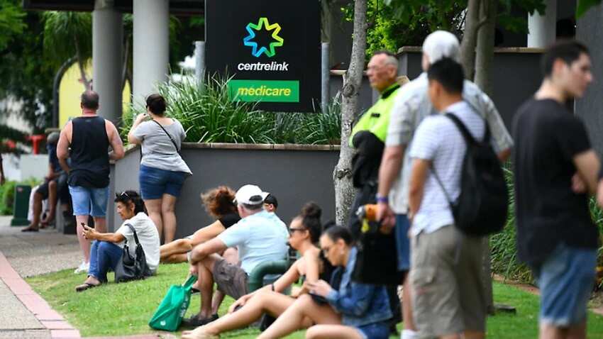 Australians wait outside a Centrelink office (FILE)