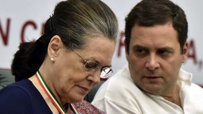 Congress Ex- president Sonia Gandhi talking with Congress party President Rahul Gandhi.